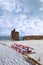 Winters view of ballybunion castle and red benches