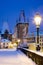 Wintertime Charles bridge, gothic Lesser Town bridge tower, Less