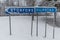 A wintery cross road with signs Storfors and Filipstad