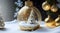 Wintery landscape of golden and white Christmas ornaments