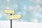 Wintry background with flares and signpost, space for text