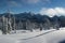 Wintry Tatoosh Mountains with Snow Covered Trees and Long Shadows