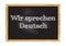 Wir sprechen Deutsch - We speak German in German blackboard notice Vector illustration