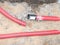 Wire in HDPE and red protectivep pipe. Lines of cables