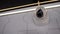 Wireless surveillance camera fixed on ceiling of office close-up