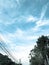 Wires pole with blue sky