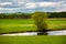 Wisconsin farmland and  pond with a dramatic sky in September