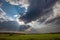 Wisconsin farmland with sunrays coming out of the clouds in September