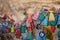 Wish tree. Small multi-colored jugs with inscriptions, wishes hanging on the branches of a tree., against the backdrop