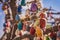 Wish tree. Small multi-colored jugs with inscriptions, wishes hanging on the branches of a tree., against the backdrop