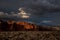 Wisp of Cloud Catches the Waning Sunlite Over Capitol Reef