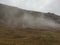 A wispy cloud meandering through the Cumbrian fells