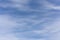 Wispy, translucent clouds against a darkening blue sky just before sunset. Suitable for abstract forms can be used as backgrounds.