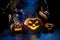 Witch casts a spell on a steaming pumpkin in the dark on Halloween