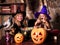 Witch children with pumpkin lantern