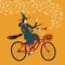 Witch on city bicycle