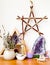 Witch`s Altar with crystals, sage smudge stick, branch pentagram