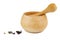 Witchery tools and ingredient: pestle, mortar with grinded beetles isolated on white