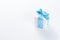 Wite gift box with blue ribbon