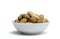 Withe bowl with peanuts with peel