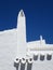 Withe chimney roof in Binibeca, Menorca, Spain