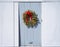 Withering wreath on door