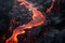 Witness the awe-inspiring natural phenomenon as molten lava gracefully cascades down the rugged mountainside., River of pahoehoe