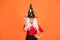 Wizard with stick. Having fun with magic. Little child in witch costume. Halloween party. Small girl in black witch hat