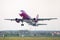 Wizzair commercial airplane takeoff from Otopeni airport in Bucharest Romania