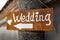 Wodden sign bord forming word wedding reception