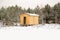 Woden cabin. Sauna with opened door against forest.