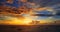 Woderful sunset in ocean with dramatic sky and clouds