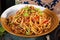 Wok with beef noodles and vegetables close up bowl Chinese food