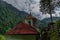 Wolfaukapelle chapel in sunny cloudy morning in Austria mountains