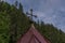 Wolfaukapelle chapel in sunny cloudy morning in Austria mountains