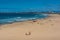 Wollongong city beach with people sunbathing, surfing and relaxing