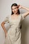 woman accessories dress beige girl cosmetic romantic background young beauty smile portrait