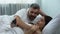 Woman addicted to gadget, ignoring husband flirting in bed, relationship crisis