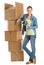 Woman With Adhesive Tape Leaning On Stacked Cardboard Boxes