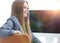 Woman administrator sitting at the workplace