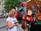 Woman admires beautiful leather handbags