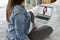 Woman in advanced pregnancy having video conference with doctor