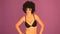 Woman with afro dancing in black underwear