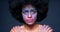 Woman, afro and face with creative makeup against a dark mockup studio background. Portrait, beauty and fantasy