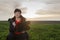 A woman agronomist examines planted young wheat