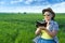 A woman agronomist in the field controls the quality of crops.