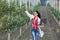 Woman agronomist in orchard