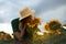 Woman agronomist standing agricultural sunflower field Caucasian female farmer straw hat Portrait agribusiness worker