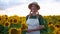 Woman agronomist standing agricultural sunflower field Caucasian female farmer straw hat Portrait agribusiness worker