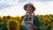 Woman agronomist standing agricultural sunflower field Caucasian female farmer straw hat Portrait agribusiness worker